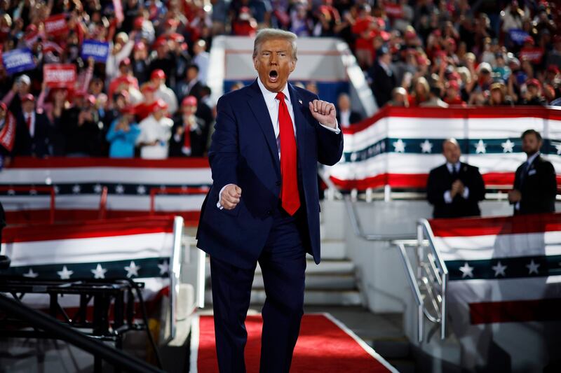 Donald Trump dances off stage at the conclusion of a campaign rally at the J.S. Dorton Arena on November 04, 2024 in Raleigh, North Carolina.