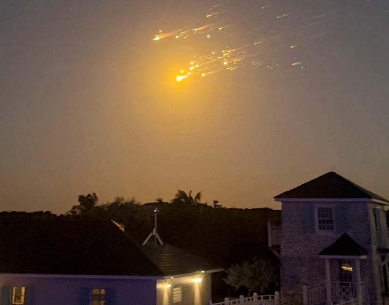 A view shows debris streaking through the sky, after SpaceX's Starship spacecraft tumbled and exploded in space, in Big Sampson Kay, Bahamas, March 6, 2025, in this screen grab obtained from social media video.