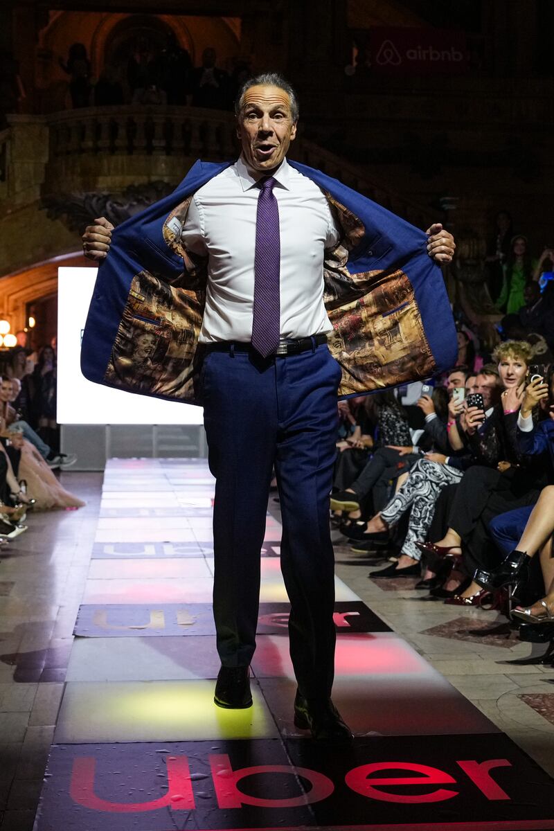 Cuomo showed off the lining of his suit, which was stitched with images of the Statue of Liberty, Marilyn Monroe, and Joe DiMaggio.