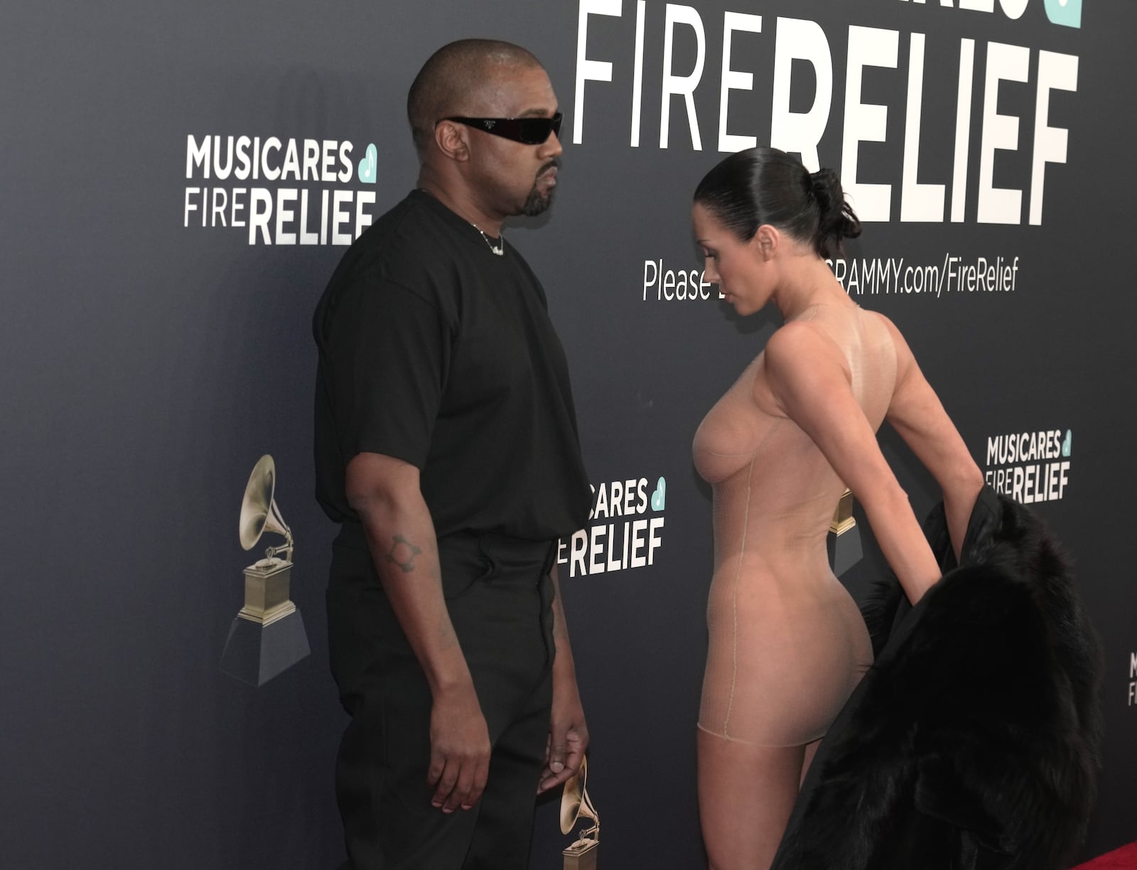 LOS ANGELES, CALIFORNIA - FEBRUARY 02: (FOR EDITORIAL USE ONLY) (EDITORS NOTE: This image contains nudity.) (L-R) Kanye West and Bianca Censori attend the 67th GRAMMY Awards at Crypto.com Arena on February 02, 2025 in Los Angeles, California. (Photo by Jeff Kravitz/FilmMagic)