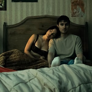 Inde Navarrette as Nikki and Michael Johnston as Bear in OBSESSION.