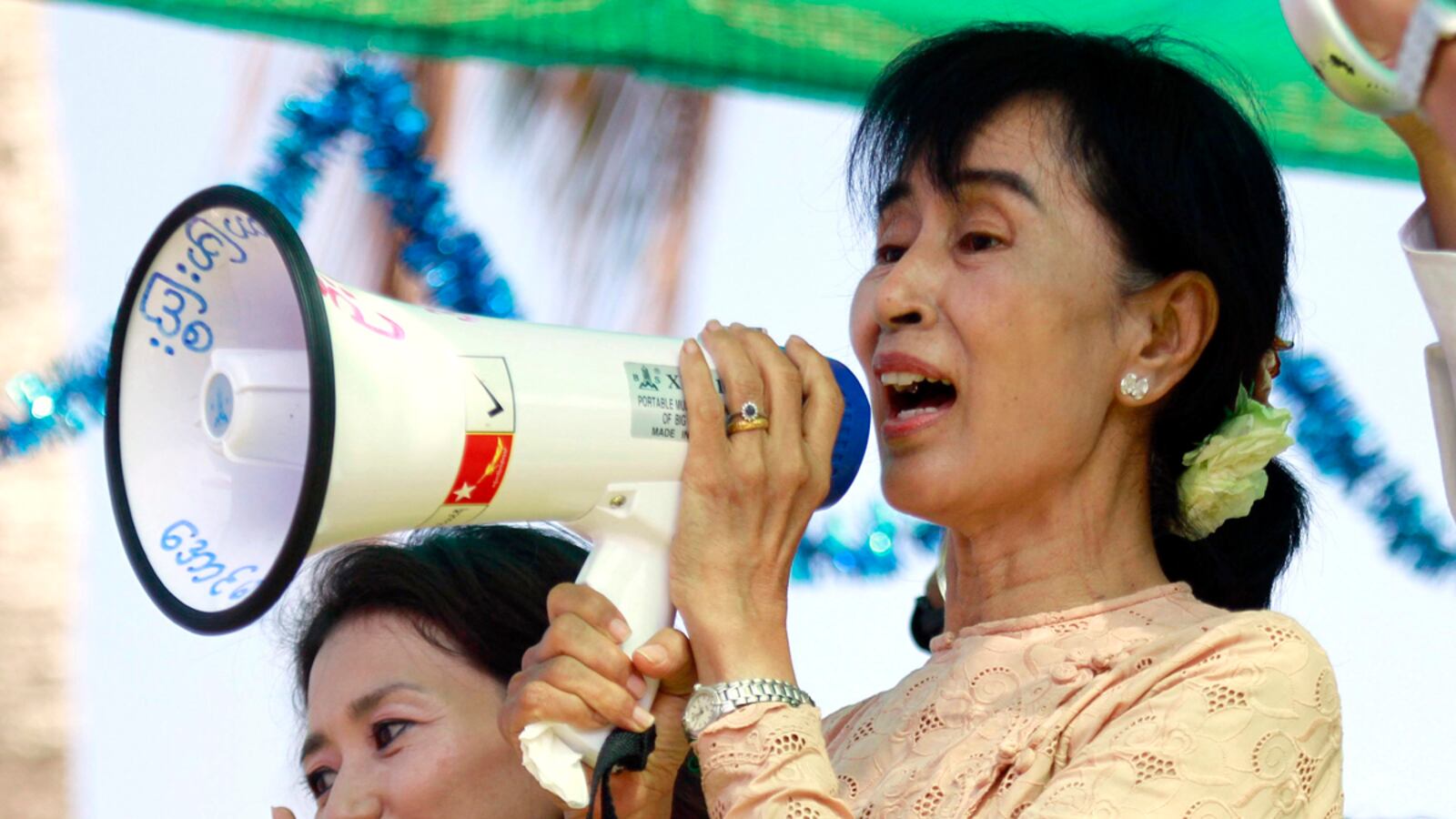 articles/2012/04/02/aung-san-suu-kyi-faces-test-after-burma-election-triumph/burma-elections-popham-tease_x7aewe