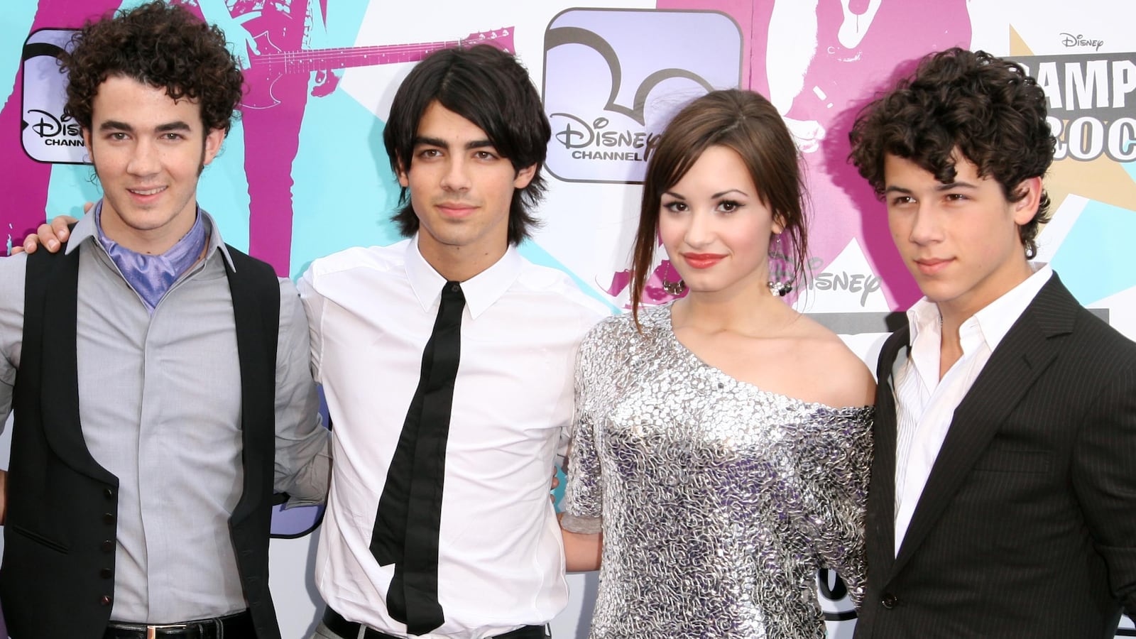 The Jonas Brothers and Demi Lovato at Camp Rock premiere in 2008.
