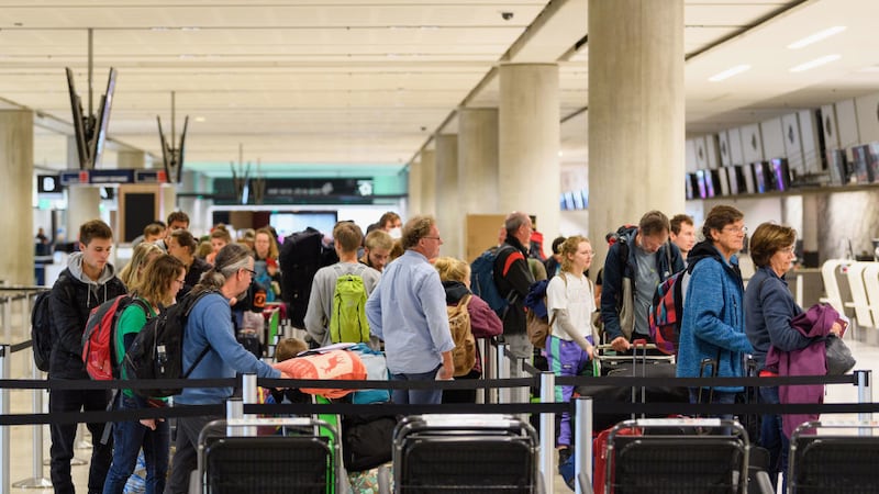 <p>"CHRISTCHURCH, NEW ZEALAND - APRIL 06: German tourists queue up to check in on their flight at Christchurch International Airport on April 06, 2020 in Christchurch, New Zealand. Air New Zealand is operating a number of special charter flights on behalf of the German government to repatriate German travellers stranded in New Zealand due the COVID-19 pandemic. New Zealand has been in complete lockdown since Thursday 26 March to stop the spread of COVID-19 across the country. (Photo by Kai Schwoerer/Getty Images)"</p>