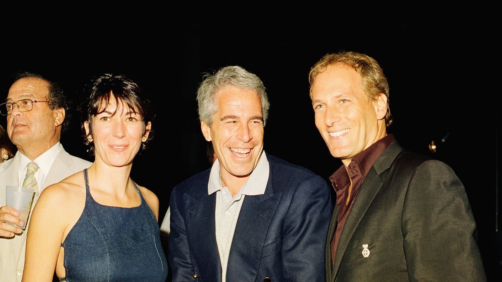 (L-R) Ghislaine Maxwell, Jeffrey Epstein, and musician Michael Bolton pose for a portrait during a party at the Mar-a-Lago club, Palm Beach, Florida, February 12, 2000. (Photo by Davidoff Studios/Getty Images)