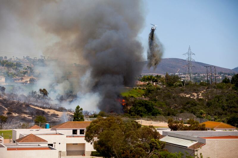 galleries/2014/05/15/wildfires-ravage-southern-california-photos/140715-cali-fires-gal02_sp2g6f
