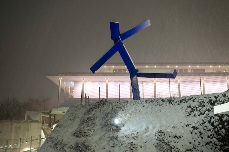 WASHINGTON, DC - FEBRUARY 11: Joel Shapiro's "Blue" is seen on a snowy night at The Reach; part of The Kennedy Center on a snowy night in Washington, DC on February 11, 2025. (Photo by Craig Hudson for The Washington Post via Getty Images)