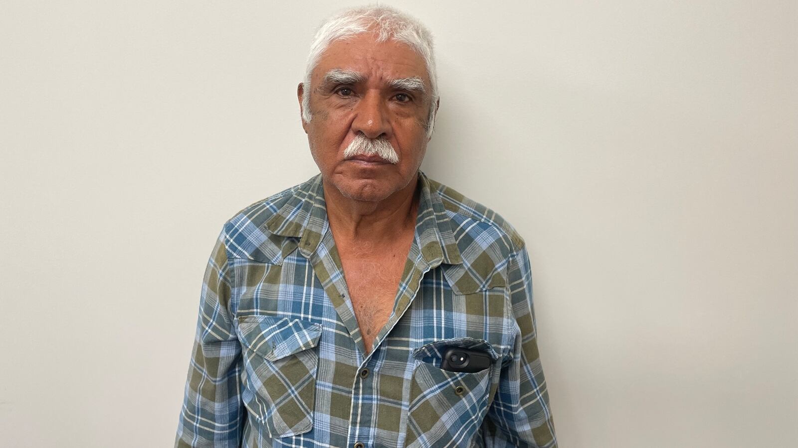 Daniel Gonzalez turned himself in and has been charged with felony hit and run after driving into a group of six migrant workers at a Walmart in North Carolina.