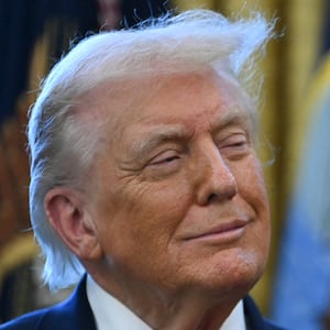 US President Donald Trump looks on during a Mexican Border Defense Medal presentation in the Oval Office of the White House in Washington, DC, on December 15, 2025.