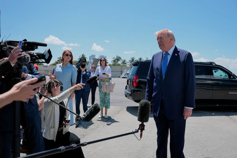 U.S. President Donald Trump speaks to the media before departing Palm Beach International Airport en route to Joint Base Andrews, in West Palm Beach, Florida, U.S., April 25, 2026. REUTERS/Kylie Cooper