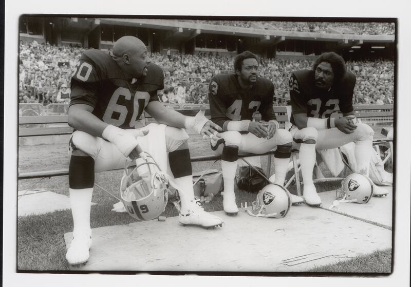 Defensive tackle Otis Sistrunk #60, safety George Atkinson #43 and safety Jack Tatum #32.