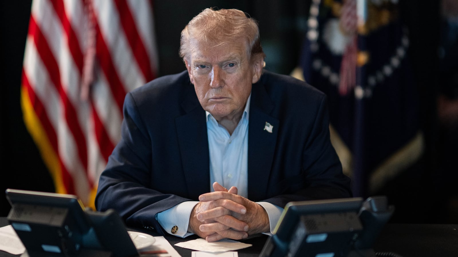 WASHINGTON DC, USA - MARCH 02: (----EDITORIAL USE ONLY â" MANDATORY CREDIT - 'THE WHITE HOUSE'S X ACCOUNT / HANDOUT' - NO MARKETING NO ADVERTISING CAMPAIGNS - DISTRIBUTED AS A SERVICE TO CLIENTS----) U.S. President Donald J. Trump sits at a table monitoring military operations during Operation Epic Fury against Iran, with U.S. flags visible behind him, in Washington, United States, on March 02, 2026. (Photo by The White House via X Account/Anadolu via Getty Images)