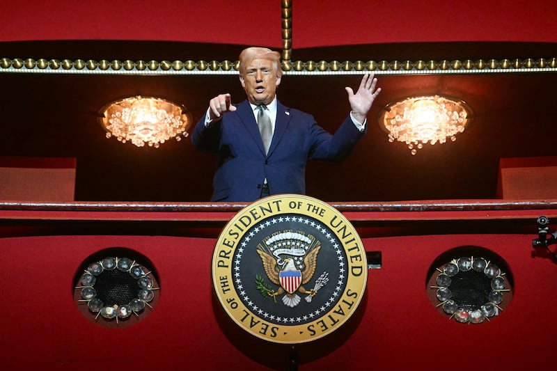 TOPSHOT - US President Donald Trump stands in the presidential box as he tours the John F. Kennedy Center for the Performing Arts in Washington, DC, on March 17, 2025. Trump was appointed chairman of the Kennedy Center on February 12, 2025, as a new board of trustees loyal to the US president brought his aggressive rightwing, anti-"woke" stamp to Washington's premier arts venue. (Photo by Jim WATSON / AFP) (Photo by JIM WATSON/AFP via Getty Images)