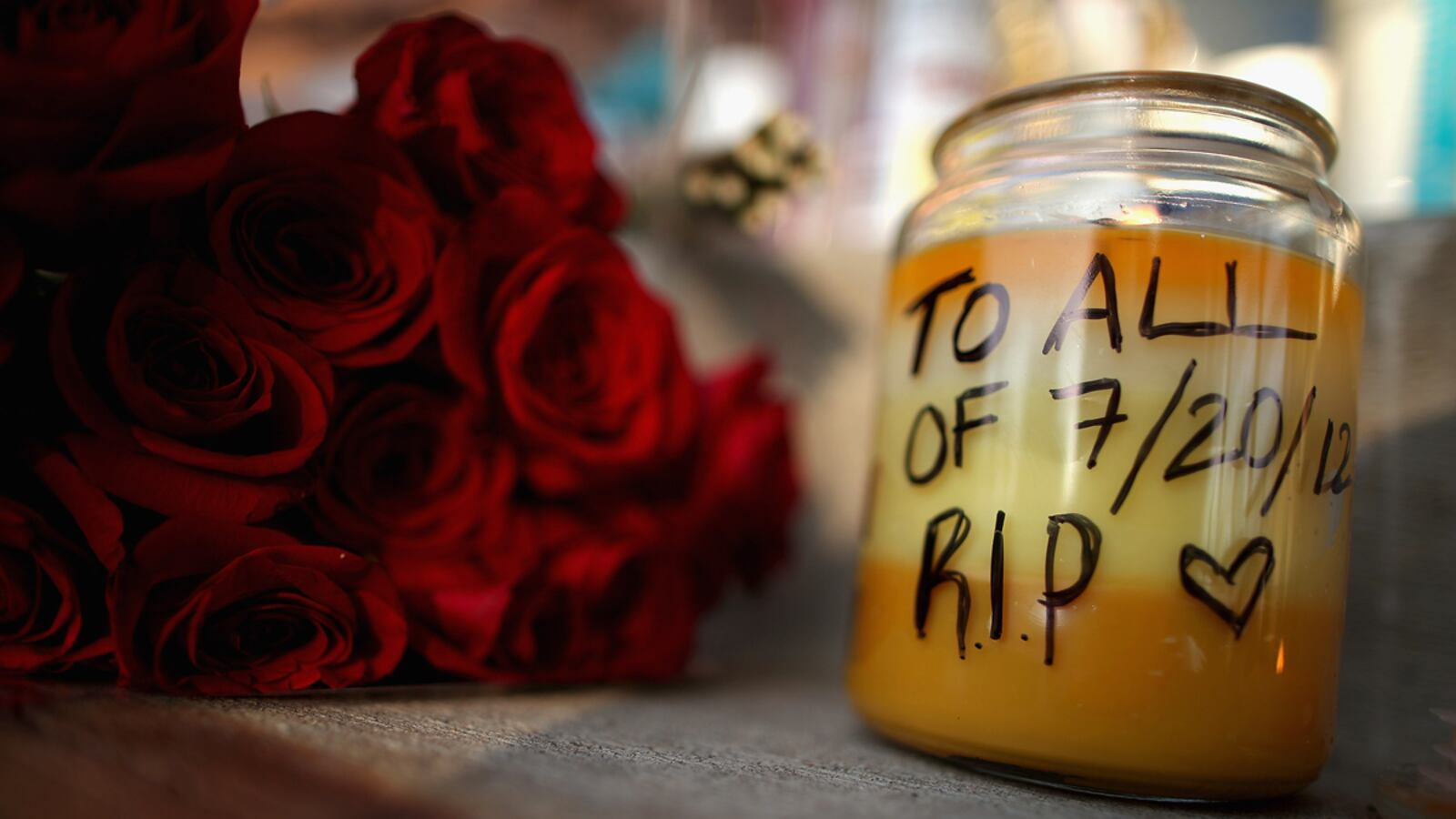 articles/2012/07/22/colorado-massacre-no-causes-no-cures/aurora-memorial_bh7bvt