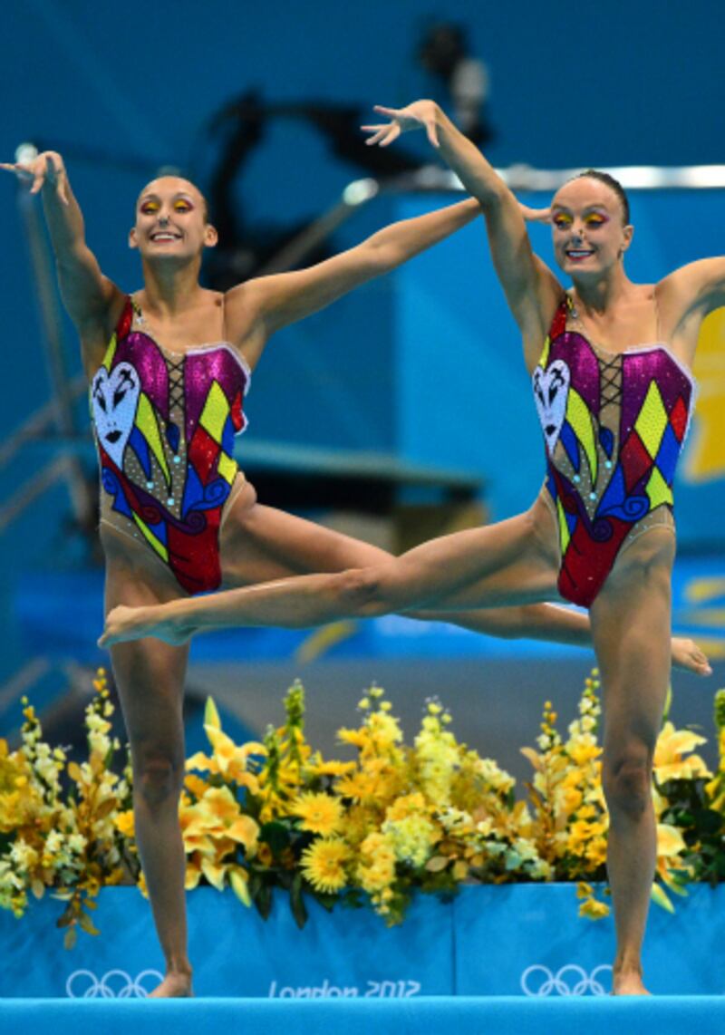 galleries/2012/08/06/from-russia-s-michael-jackson-suits-to-switzerland-s-gangsters-the-11-craziest-synchronized-swimming-suits/canada-bathingsuits_kojbb7