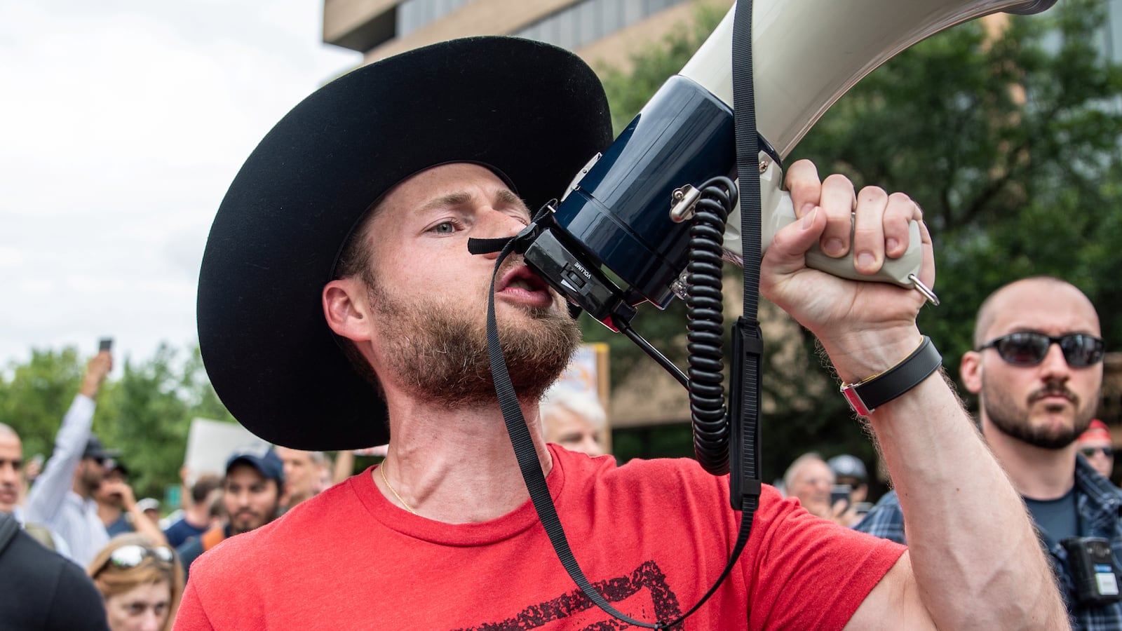 Infowars host Owen Shroyer joins a protest against mandates to wear masks amid the coronavirus disease (COVID-19) outbreak in Austin, Texas,