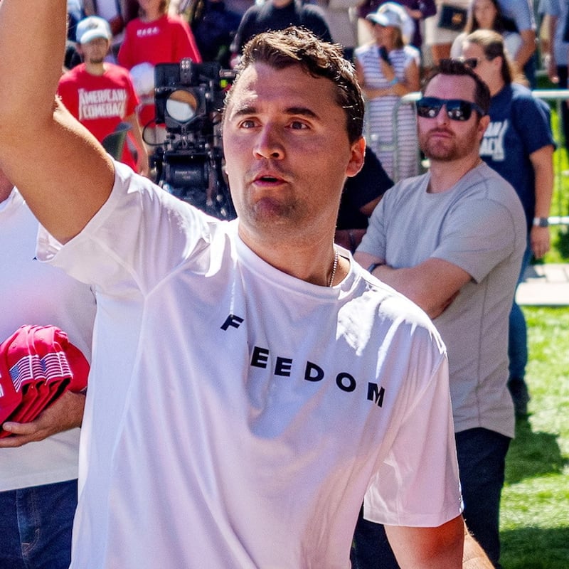 Right-wing activist and commentator Charlie Kirk throws hats to the crowd shortly before he was shot at a Utah Valley University speaking event in Orem, Utah, Sept. 10, 2025.