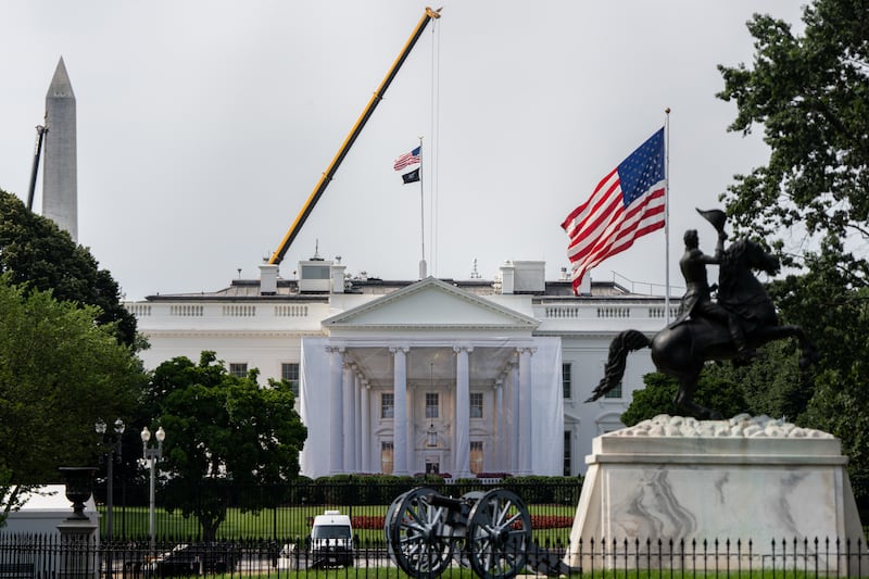 A tarp covers scaffolding on the North Portico of the White House, Friday, July 10, 2026, in Washington.