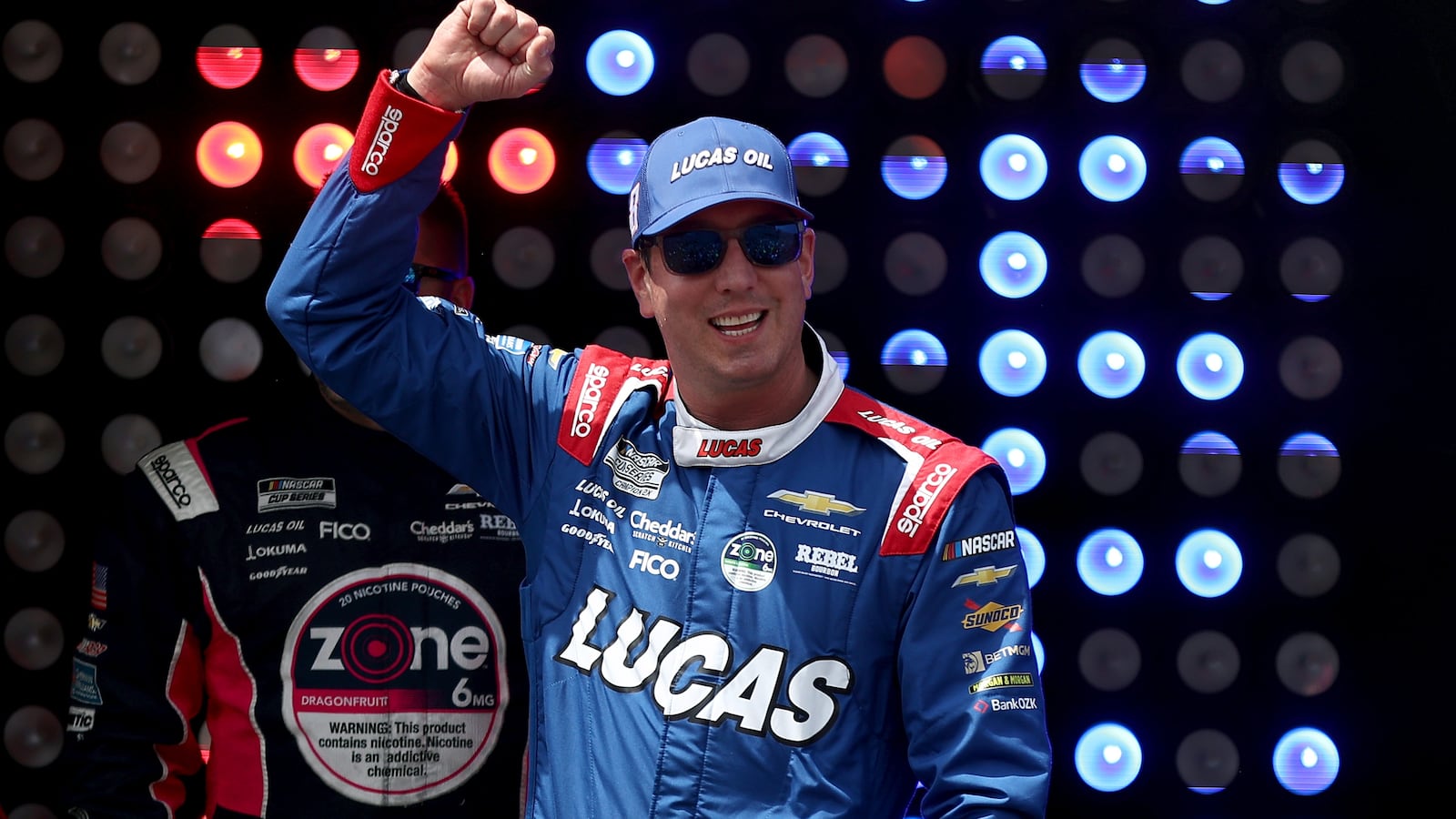 Kyle Busch, driver of the #8 Lucas Oil Chevrolet, walks onstage during driver intros prior to the NASCAR Cup Series All-Star Race at Dover Motor Speedway on May 17, 2026 in Dover, Delaware.