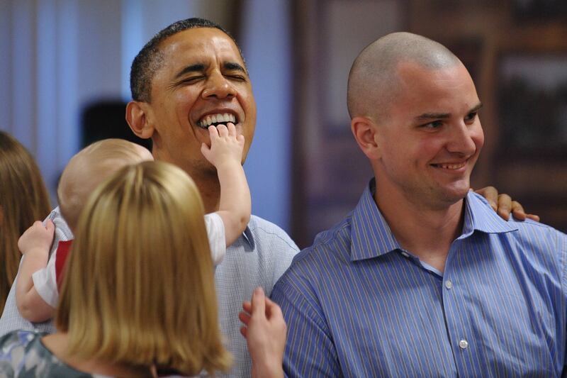 galleries/2012/10/16/paul-ryan-ramrods-soup-kitchen-sarah-palin-s-turkey-massacre-more-epic-political-photo-op-disasters/obama-baby-political-photo-ops-gone-wrong_njkmwd