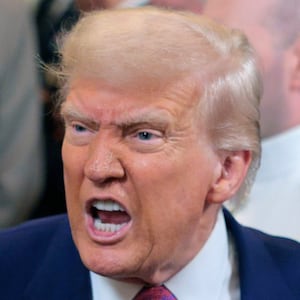 President Donald Trump responds to a reporters question as he leaves after signing a series of bills related to California’s vehicle emissions standards during an event in the East Room of the White House on June 12, 2025 in Washington, DC.