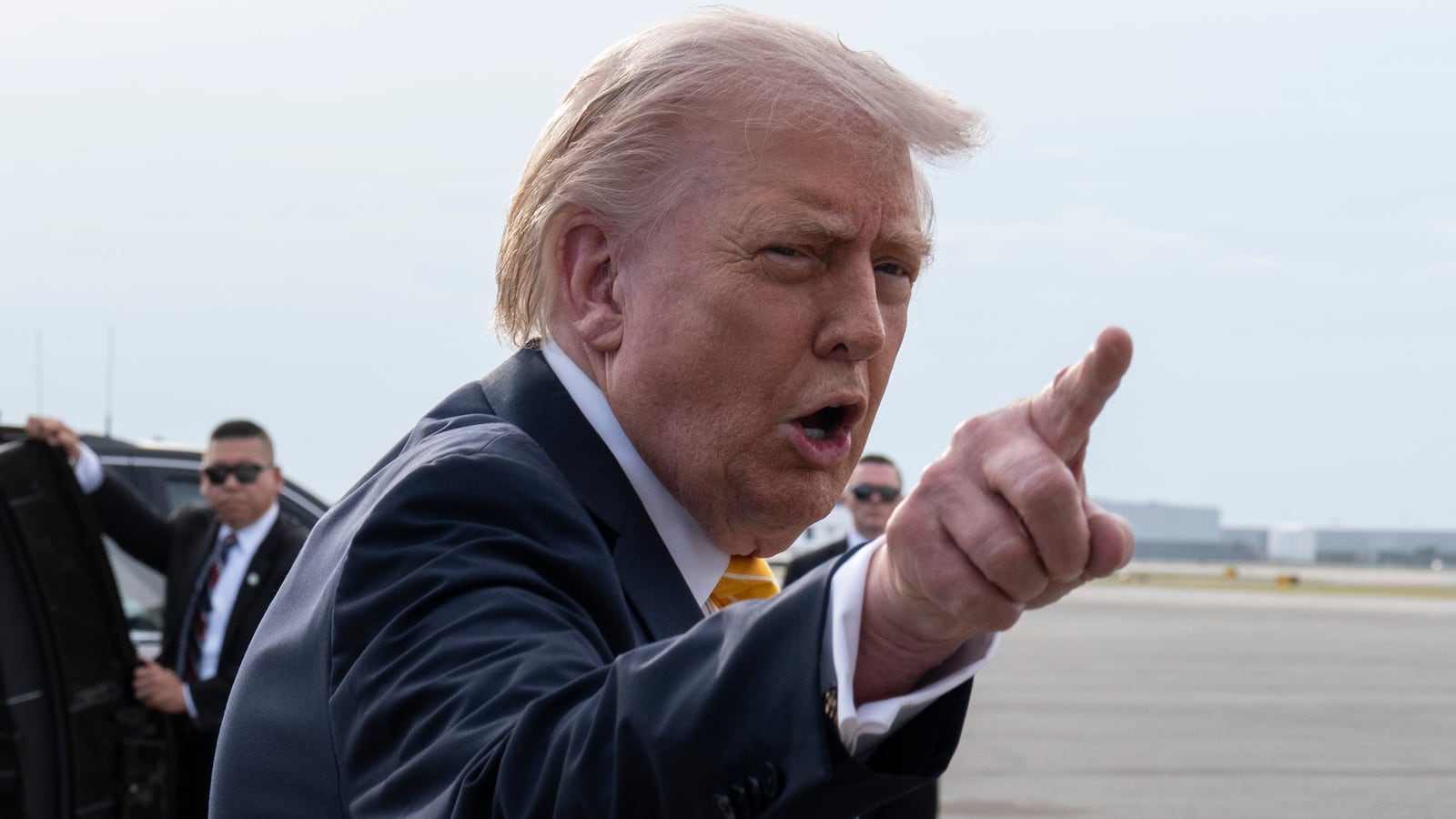 President Donald Trump speaks to journalists before boarding Air Force One at Palm Beach International Airport on May 2, 2026 in Palm Beach, Florida.