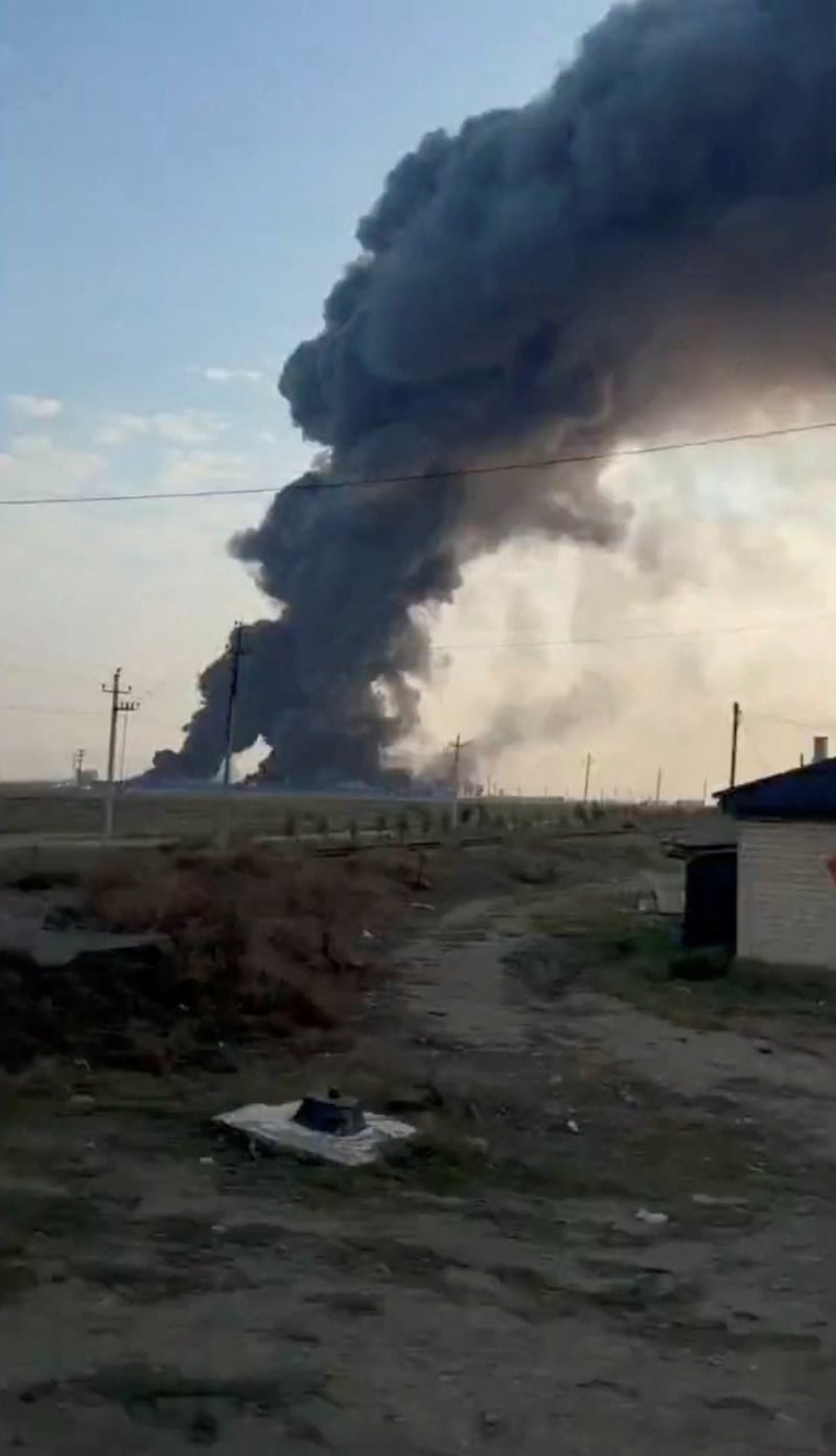 Some rises from Ozon facility following a Ukrainian drone strike, in Makhachkala, Dagestan, Russia, in this screengrab taken from a social media video August 24, 2026. Social Media/via REUTERS  THIS IMAGE HAS BEEN SUPPLIED BY A THIRD PARTY. NO RESALES. NO ARCHIVES.  VERIFICATION:  Buildings, car park, road layout and tower matched satellite and archive imagery Coordinates: 43.04818428302994, 47.27209078613819 and 43.031696082727656, 47.26032020541529. Date verified by a satellite image showing smoke rising from the Ozon facility on August 24. Official statement from Ozon saying that three of their facilities, including near Makhachkala in Dagestan, were struck by drones during the night on August 24. No older versions found posted online before August 24. NASA FIRMS detected thermal activity in the exact coordinates at 0544 GMT on August 24.