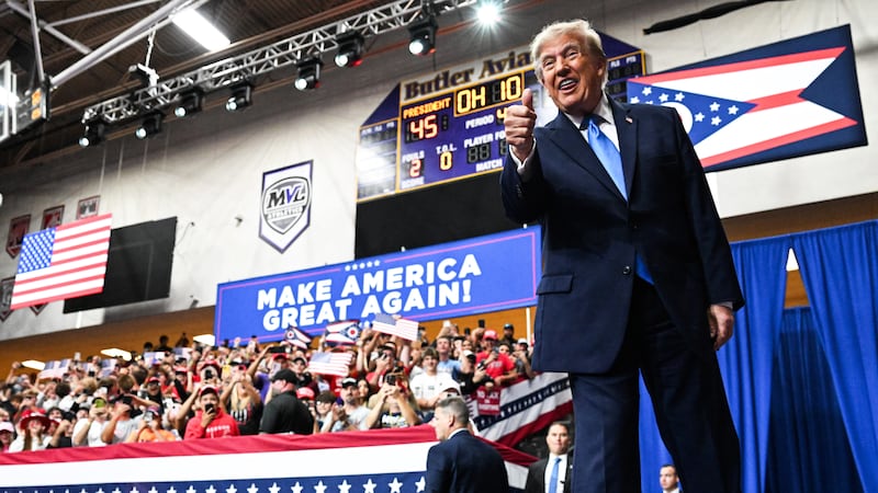 U.S. President Donald Trump takes the stage to speak at the Butler-Vandalia Student Activity Center during a campaign rally on October 03, 2026 in Vandalia, Ohio.