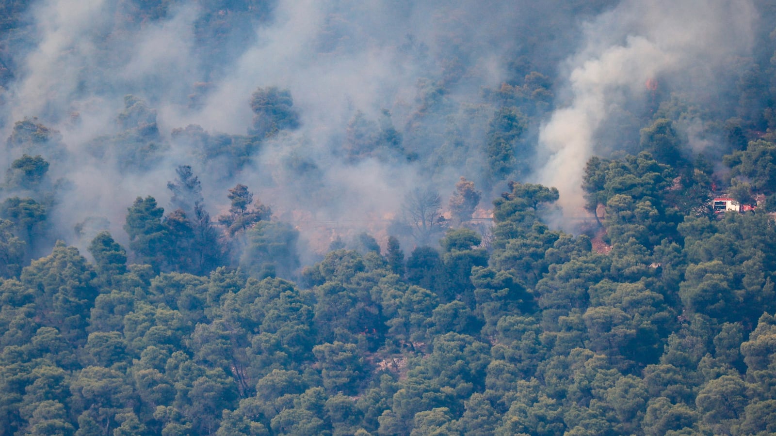 This photo shows the spot on the mountain where one of the two firefighting helicopters crashed in the Psatha area in Viotia region, west of Athens, on August 2, 2026.