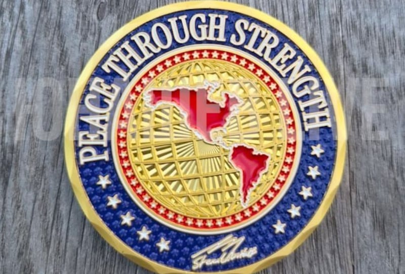 A commemorative coin reportedly given to Putin