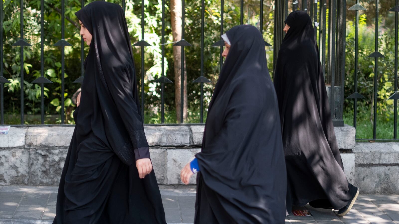 Iranian women protest near the University of Tehran