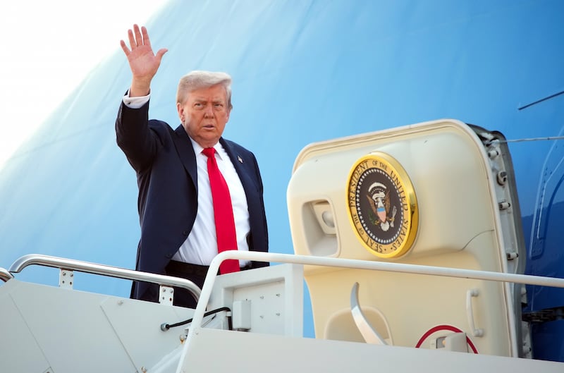 President Donald Trump boards Air Force One on August 15, 2025 at Joint Base Andrews, Maryland.