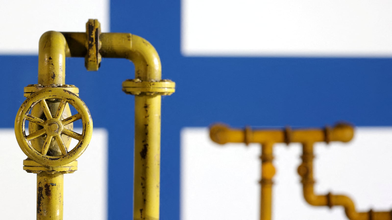 Model of natural gas pipeline and Finland flag, July 18, 2022.