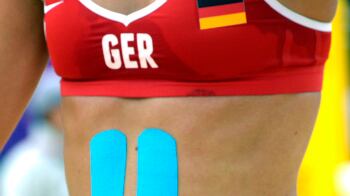 articles/2012/08/09/the-olympics-most-colorful-new-trend-kinesio-tape/germany-kinesio-tape_nioehp