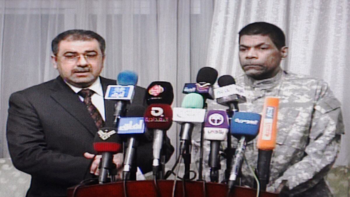 cheats/2012/03/17/u-s-man-freed-in-iraq/iraq-prisoner-release-cheat_cplim9