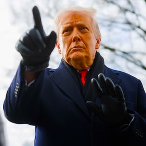 President Donald Trump speaks to reporters on the South Lawn before boarding Marine One at the White House on January 16, 2026 in Washington, DC.