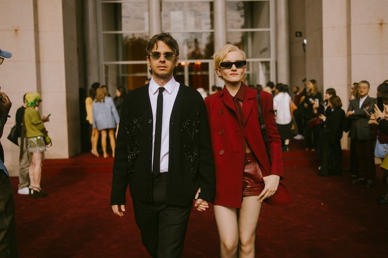Mark Foster and Julia Garner at Milan Ready to Wear Fashion Week on September 20, 2024 in Milan, Italy. (Photo by Christina Fragkou/WWD via Getty Images)
