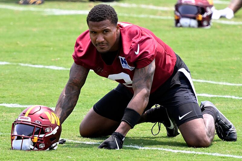 ASHBURN, VA - June 11:  Washington Commanders safety Will Harris warms up during day two of mini camp in Ashburn, VA on June 11, 2025. (Photo by John McDonnell/For The Washington Post via Getty Images)