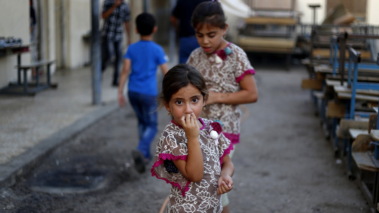 articles/2015/06/15/mosul-is-safe-clean-and-run-by-isis/150614-niqash-mosul-year-tease_jwilo5