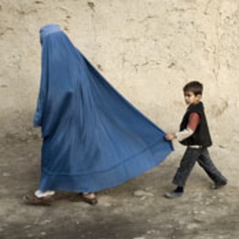 articles/2009/12/01/what-the-surge-means-for-women/lemmon-afghanistan-women_66461_adbmek
