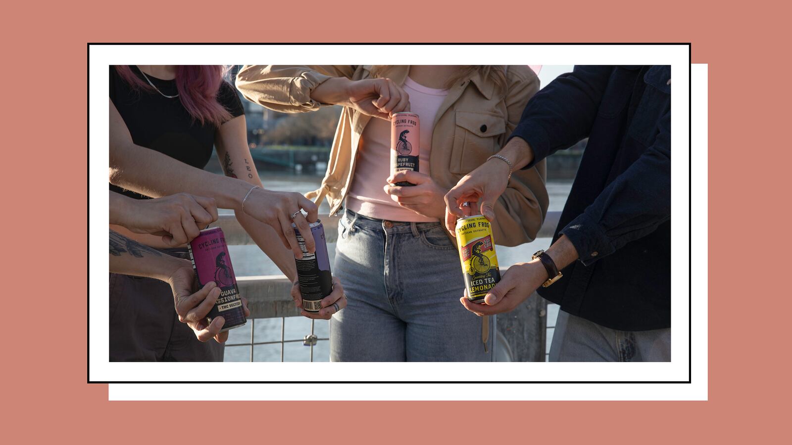 People opening Cycling Frog THC Seltzers