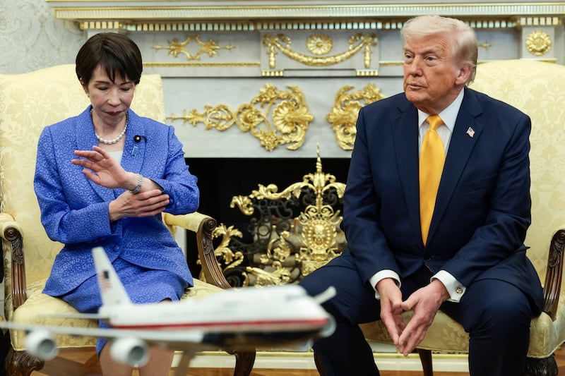 Japanese Prime Minister Sanae Takaichi looks at her watch during a meeting with U.S. President Donald Trump in the Oval Office at the White House in Washington, D.C., U.S., March 19, 2026. REUTERS/Evelyn Hockstein