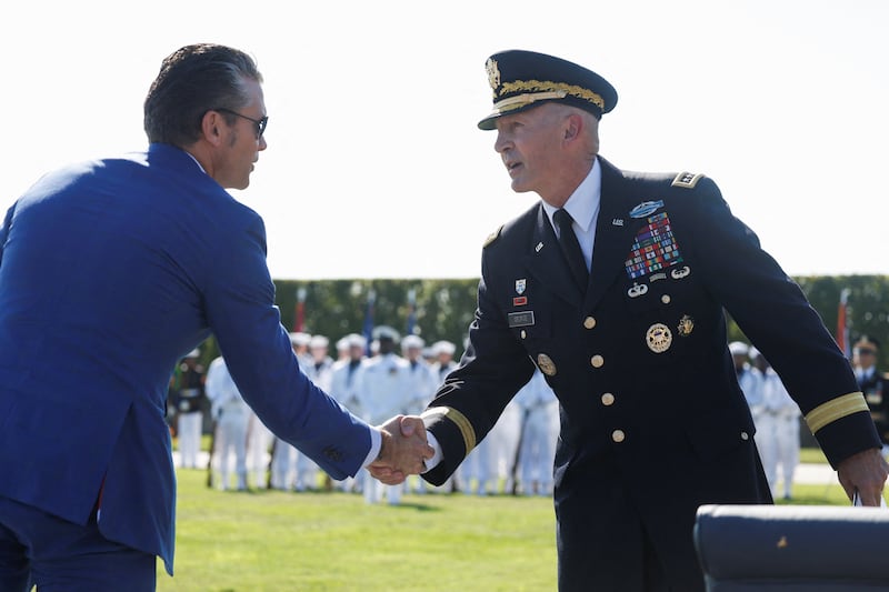 U.S. Defense Secretary Pete Hegseth shakes hands with General Randy George, Chief of Staff of the U.S. Army, during a ceremony honoring prisoners of war, at the Pentagon in Washington, D.C. U.S., September 19, 2025.