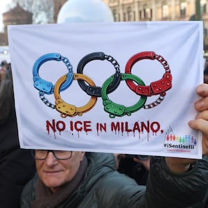 MILAN, ITALY - JANUARY 31: Thousands of demonstrators, holding banners, march to protest against the presence of US Immigration and Customs Enforcement (ICE)âs agents for the Winter Olympic Games in Italy next month on January 31, 2026. Agents from the controversial ICE will help support security operations for the Winter Olympic Games in Italy next month, sources at the US Embassy in Rome said on Tuesday. The protesters carried banners saying âStop the gestapo (ICE) from kidnapping peopleâ, âIllegal Criminal Inforcementâ, âICE go homeâ and marched the city streets. The possible presence of ICE agents on the Italian territory during the Olympic Games Milan-Cortina 2026 has sparked a heated debate in the country, after ICE was involved in the killings of two American citizens during their surveillance operations in the US. (Photo by Michele Luigi Edoardo Novaga/Anadolu via Getty Images)
