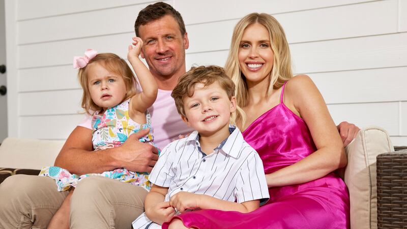 Swimming: Summer Olympics Preview: Portrait of USA Ryan Lochte with his wife Kayla, daughter Liv and son Caiden at home during photo shoot.