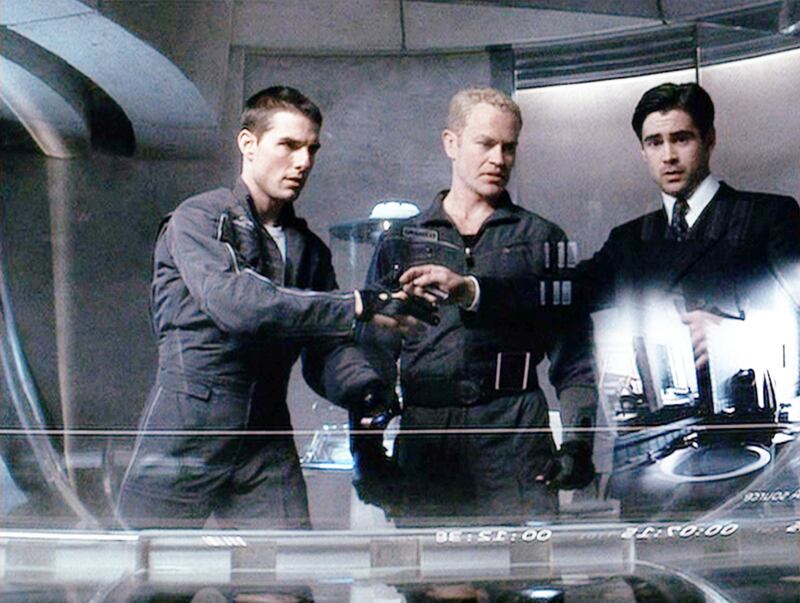 Tom Cruise (as Chief John Anderton), Neal McDonough (as Officer Fletcher) and Colin Farrell (as Danny Witwer) in “Minority Report.”