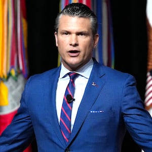 US Secretary of Defense Pete Hegseth addresses senior military officers at Marine Corps Base Quantico in Quantico, Virginia, on September 30, 2025. Pentagon chief Pete Hegseth on Tuesday told a rare gathering of top brass called back from bases around the world that the US military will be reformed to end what he called "decades of decay." Speaking to hundreds of generals and admirals in Quantico, Virginia, Hegseth declared an end to "ideological garbage," giving concerns over climate change, bullying, "toxic" leaders, and promotions based on race or gender as examples. (Photo by Andrew Harnik / POOL / AFP) (Photo by ANDREW HARNIK/POOL/AFP via Getty Images)