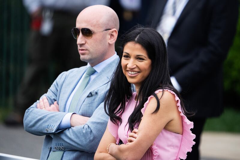 Stephen Miller, White House deputy chief of staff, and his wife, Katie Miller, an aide for DOGE, attend the White House Easter Egg Roll on Monday, April 21, 2025.
