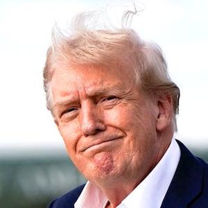 President Donald Trump reacts, as he arrives at Joint Base Andrews, Maryland, U.S., September 26, 2025.