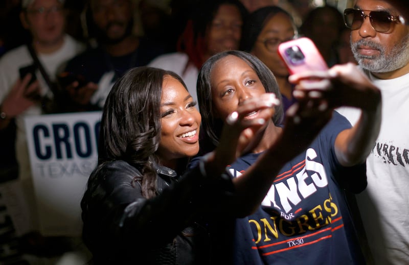 Rep. Jasmine Crockett takes selfies with supporters on February 27, 2026 in Dallas as she runs for the Senate in the Democratic primary.